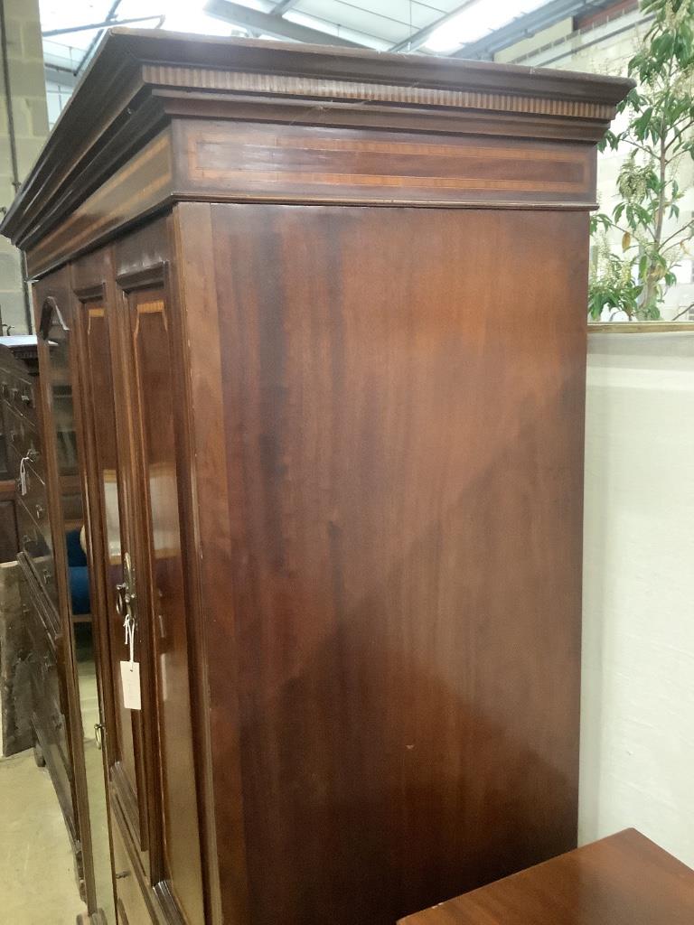 An Edwardian satinwood banded mahogany wardrobe, width 160cm, depth 56cm, height 206cm